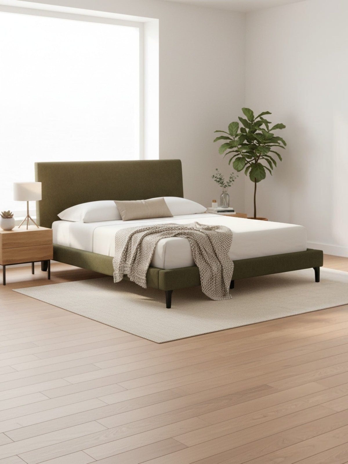 Lit très grand TOCO Meubles Alma rembourré en tissu vert sauge au design moderne et profil bas dans une chambre