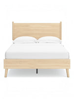 Lit double Anita en bois naturel de TOCO Meubles, design plateforme moderne avec tête de lit épurée et pieds fuselés.