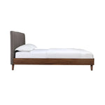 Lit Atlas TOCO Meubles gris avec tête de lit capitonnée et cadre imitation noyer, style Mid-Century Modern.