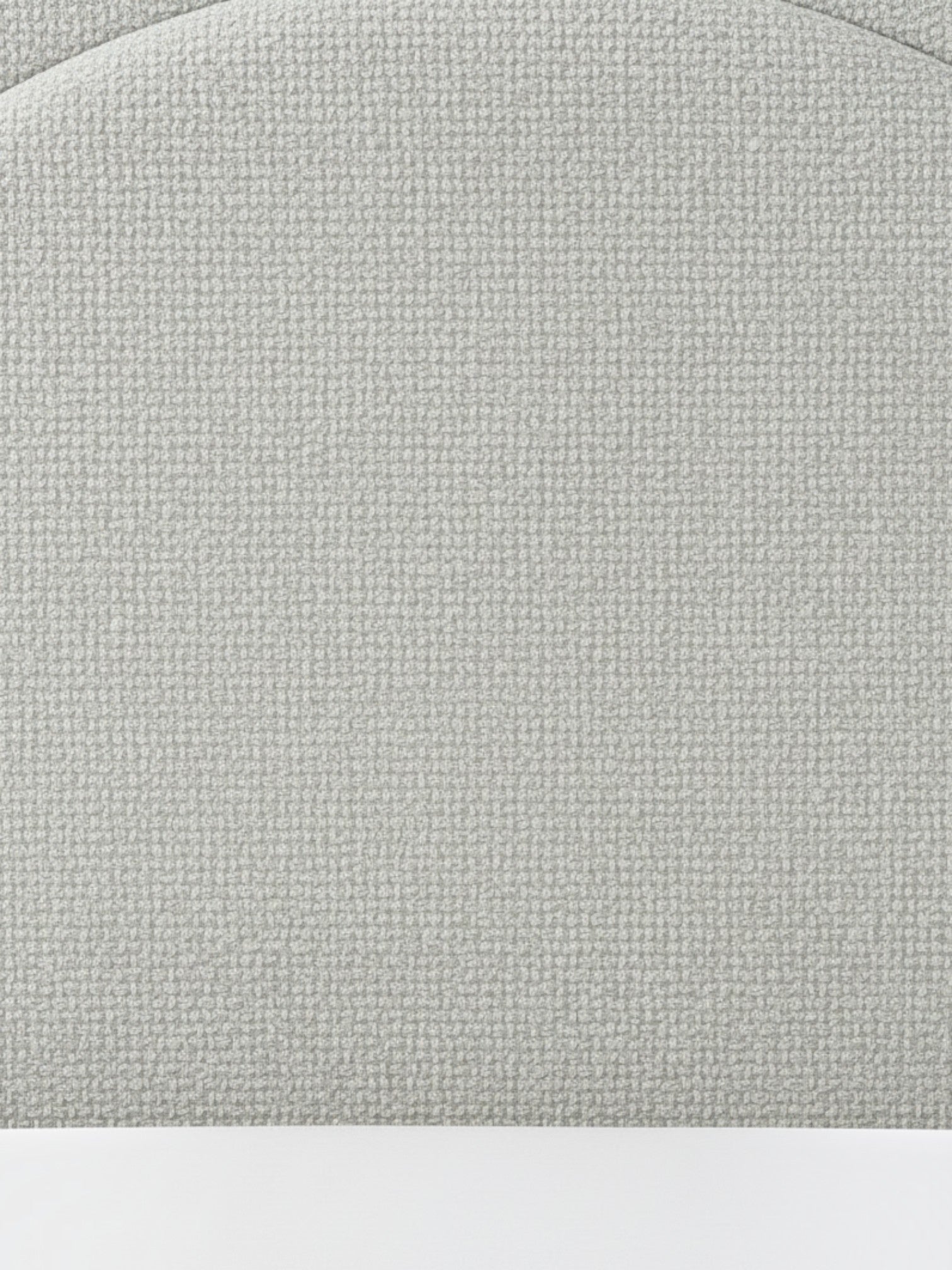 Gros plan sur le tissu bouclé crème de la tête de lit TOCO Meubles Ivy, texture douce et moderne