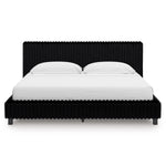Lit Chloe très grand en tissu noir texturé côtelé de TOCO Meubles, design contemporain et chic.