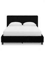 Grand lit Chloe noir en tissu texturé côtelé, design contemporain et chic par TOCO Meubles.