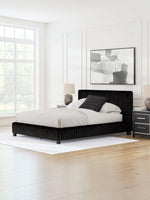 TOCO Meubles Lit Chloe noir en tissu côtelé, design contemporain et chic pour chambre à coucher.
