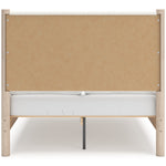 Lit double Margot TOCO Meubles en bois clair avec tête de lit rembourrée blanche texturée et panneau central en bois brut.