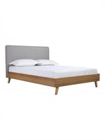 Lit double Nova TOCO Meubles avec tête de lit rembourrée grise et cadre en bois brun, style Mid-Century Modern.
