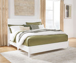 Lit Gisele blanc contemporain TOCO Meubles avec tête de lit à lattes et couvre-lit vert olive.