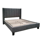 Lit plateforme gris foncé TOCO Meubles Lorenzo avec tête de lit capitonnée et clous décoratifs, finition tissu effet lin.