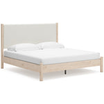 Lit Margot TOCO Meubles en bois clair avec tête de lit rembourrée texturée blanc cassé, style boho minimaliste.