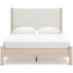 TOCO Meubles Grand Lit Margot, lit plateforme minimaliste en bois clair avec tête de lit rembourrée texturée blanc cassé.