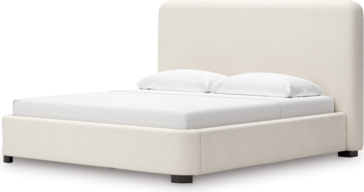 Lit Paloma TOCO Meubles très grand, rembourré en tissu bouclé crème avec tête de lit enveloppante et pieds discrets.