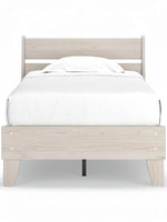 Lit simple Solene en bois clair avec tête de lit à lattes et sommier blanc par TOCO Meubles