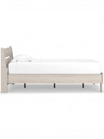 Lit simple Solene en bois clair de TOCO Meubles, style contemporain avec tête de lit à lattes et profil bas.