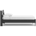 Lit simple Solene TOCO Meubles en bois sombre, design contemporain avec tête de lit à lattes et cadre bas.