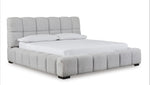 Lit Sofia TOCO Meubles gris clair capitonné en tissu texturé, design contemporain et confortable.