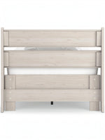 Lit TOCO Meubles Solene en bois clair avec un design contemporain et épuré, parfait pour les petits espaces.