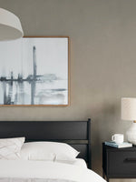Lit contemporain noir Solene de TOCO Meubles avec tête de lit épurée dans une chambre moderne et élégante.