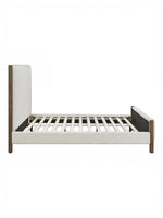 Très grand lit TOCO Meubles Zavian en tissu chenille beige avec structure plateforme et montants en bois chêne