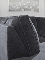 TOCO Meubles Sofa-lit sectionnel Marcel gris foncé en tissu avec coussins texturés et design moderne.