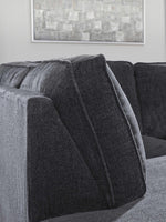 TOCO Meubles Sofa-lit sectionnel Marcel gris foncé en tissu avec coussins texturés et design moderne.