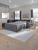 TOCO Meubles Sofa-lit sectionnel Marcel en tissu gris foncé, convertible en lit, design moderne pour salon.