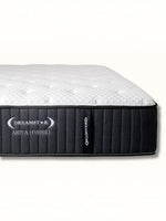 Matelas Ariya Hybrid TOCO Meubles avec surface matelassée blanche et côtés noirs, technologie hybride et gel