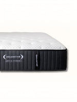 Matelas Ariya Hybrid TOCO Meubles avec surface matelassée blanche et bordure noire, technologie hybride de qualité