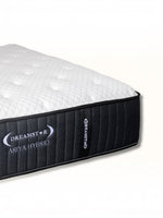Matelas Ariya Hybrid TOCO Meubles avec surface matelassée blanche et côtés noirs, technologie hybride à ressorts.