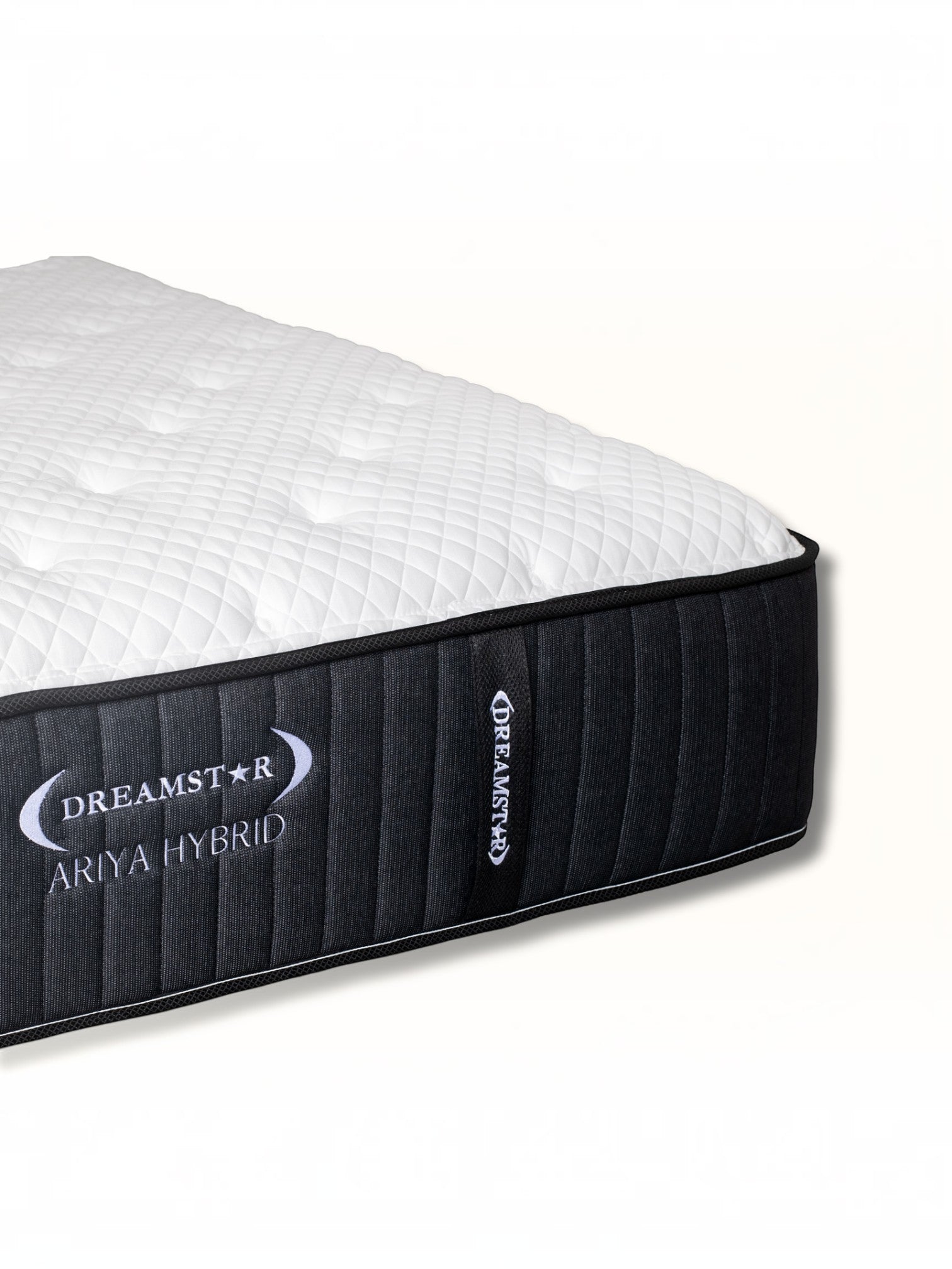 Matelas Ariya Hybrid TOCO Meubles avec surface matelassée blanche et côtés noirs, technologie hybride à ressorts.