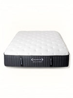 Matelas Ariya Hybrid TOCO Meubles avec surface matelassée blanche et côtés noirs, technologie hybride et gel frais.
