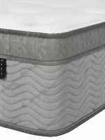 Gros plan sur le matelas TOCO Meubles Back Care Quartet avec finition grise texturée et coutures ondulées