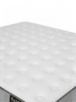 Matelas ferme TOCO Meubles BackCare Duo avec ressorts ensachés et surface blanche capitonnée