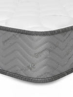 Matelas TOCO Meubles BackCare Solo ferme avec bordure grise texturée et surface blanche matelassée