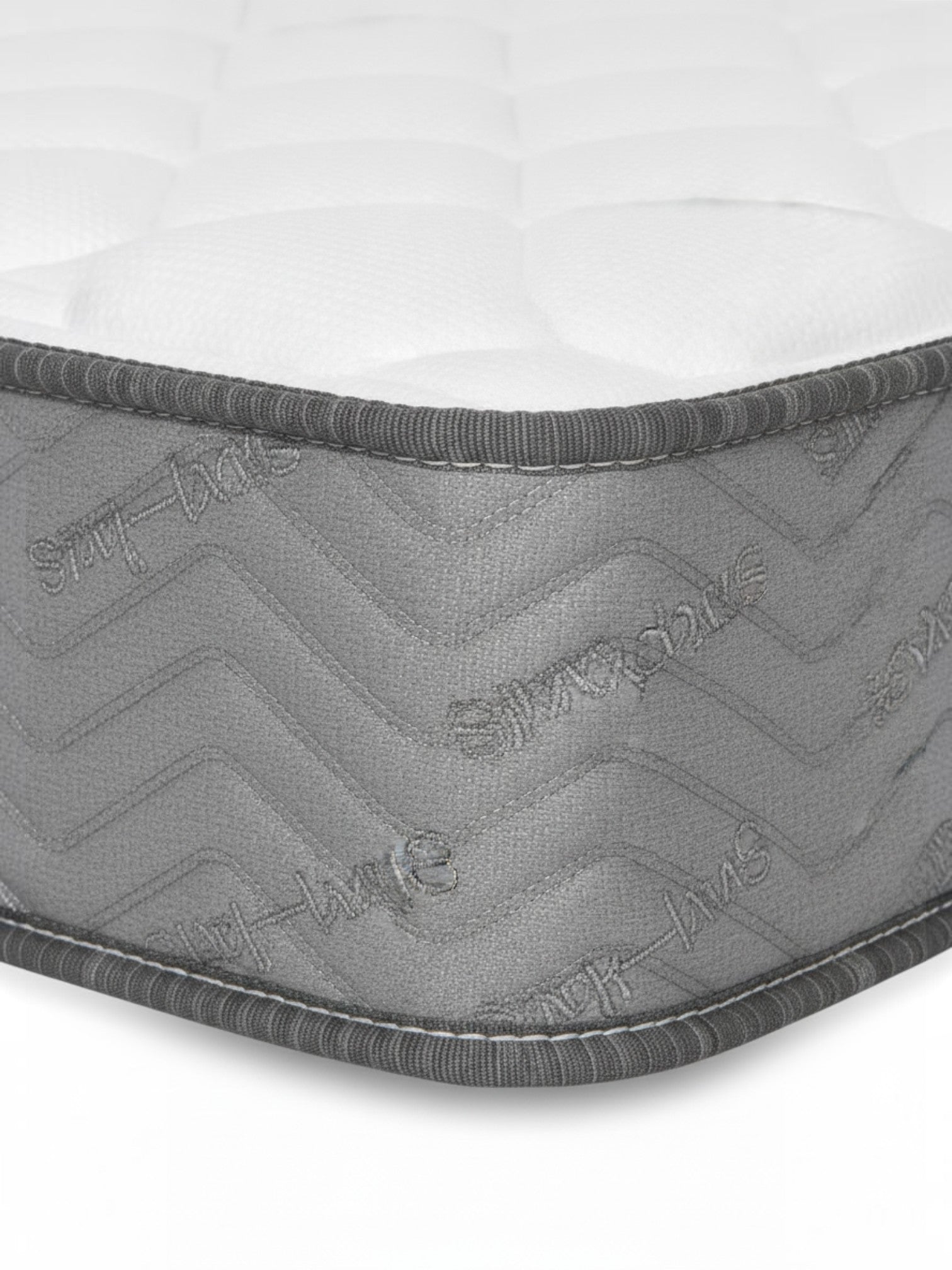 Matelas TOCO Meubles BackCare Solo ferme avec bordure grise texturée et surface blanche matelassée