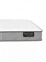 Matelas BackCare Solo par TOCO Meubles avec bordure grise texturée et étiquette de marque visible
