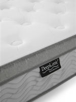 Matelas TOCO Meubles BackCare Trio blanc avec finition capitonnée et bordure grise texturée