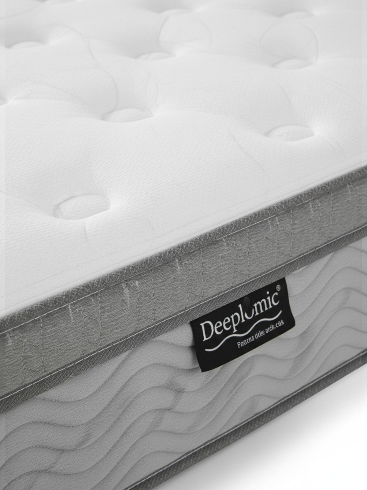 Matelas TOCO Meubles BackCare Trio blanc avec finition capitonnée et bordure grise texturée