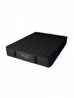 Matelas Dream Shadow HD très grand format de TOCO Meubles, réversible, ferme, avec tissu tricoté noir et capitonnage.