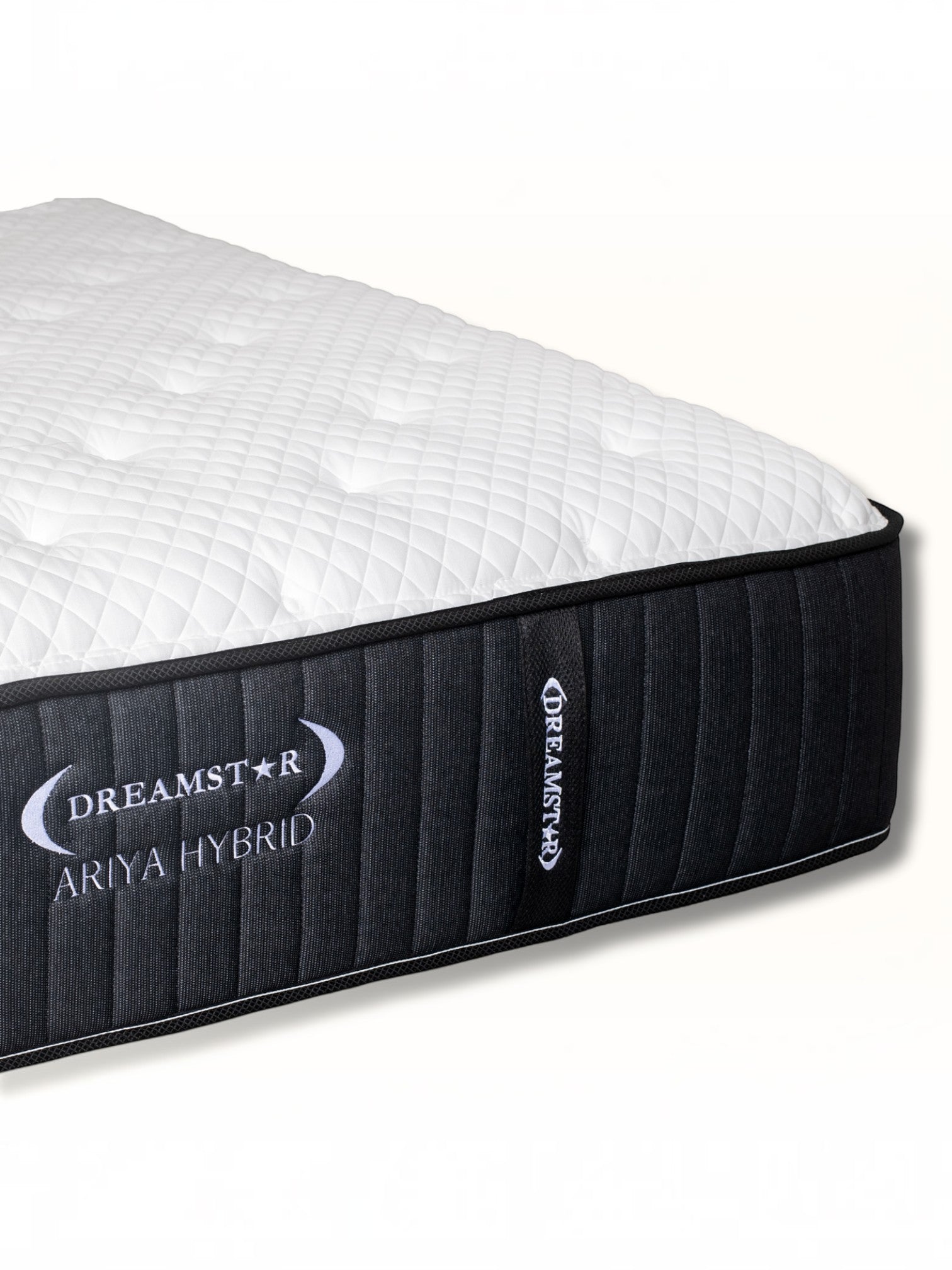 Matelas hybride TOCO Meubles Ariya avec surface matelassée blanche et côtés noirs, technologie à ressorts ensachés.