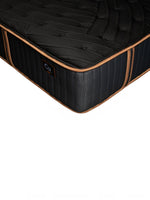 Matelas hybride Copper Sleep TT de TOCO Meubles, noir avec bordures cuivrées et logo Cu sur le côté