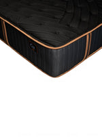 Matelas hybride Copper Sleep TT de TOCO Meubles, noir avec bordures cuivrées et logo Cu sur le côté