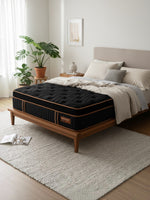 Matelas hybride TOCO Meubles Cu Sleep ET noir avec Euro Top, installé dans une chambre moderne et lumineuse.
