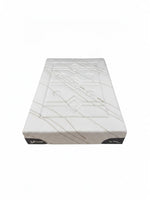 Matelas TOCO Meubles Ultra Medium avec tissu rafraîchissant blanc et motifs géométriques, vue en perspective