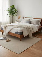 Matelas Ultra Plush TOCO Meubles avec tissu rafraîchissant et mousse gel dans une chambre moderne et chaleureuse.