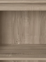Gros plan sur la texture en bois taupe du meuble télé Belvo 48'' de TOCO Meubles