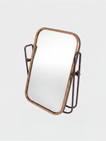 Miroir mural basculant TOCO Meubles en métal bicolore au design industriel épuré pour une décoration moderne.