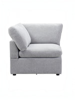 TOCO Meubles Modulaire Monaco gris clair, fauteuil d'angle en tissu avec coussin assorti.