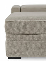 Ottoman Kael de TOCO Meubles en tissu texturé beige avec rangement intégré et coutures apparentes