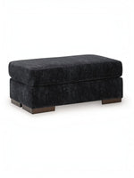 Ottoman Mistral de TOCO Meubles rectangulaire en tissu texturé gris foncé avec pieds en bois massif
