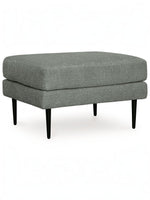 Ottoman Zela de TOCO Meubles en tissu gris anthracite avec pieds noirs effilés