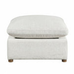 Pouf modulaire TOCO Meubles Montrose en tissu chenille beige texturé avec pieds en bois sur fond blanc